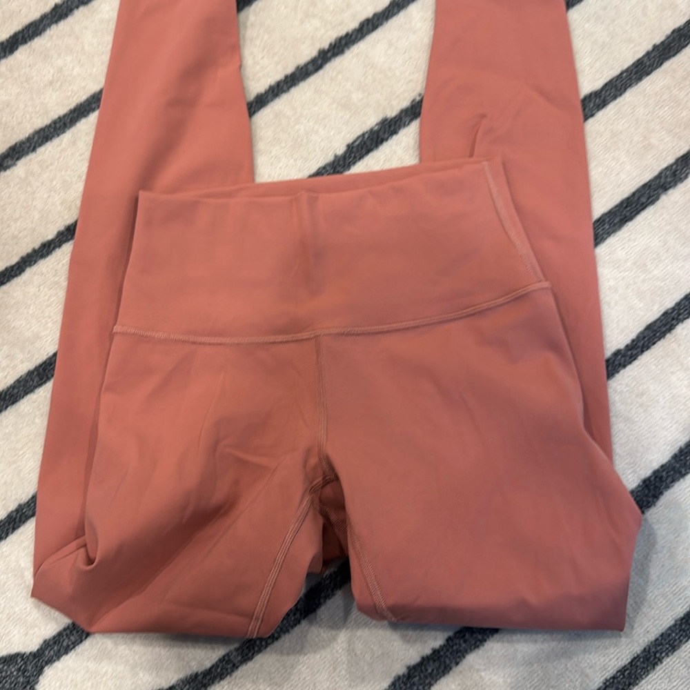 Lululemon pink leggings size 4